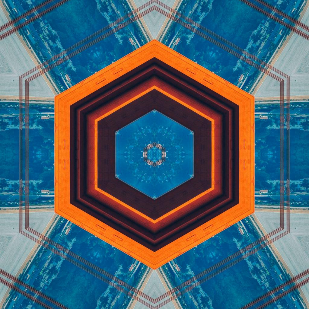 Colorful hexagonal abstract art with blue and orange, vibrant geometry.